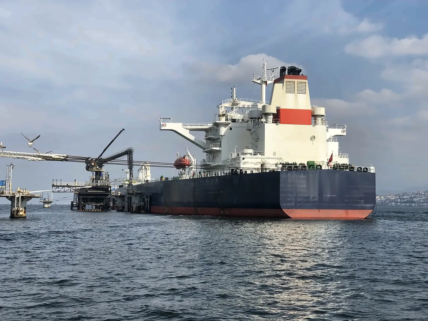 A crude oil tanker alongside an offshore terminal